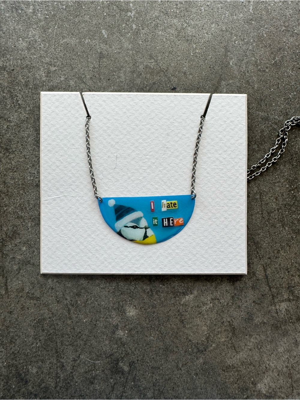 “I hate it here” bird necklace